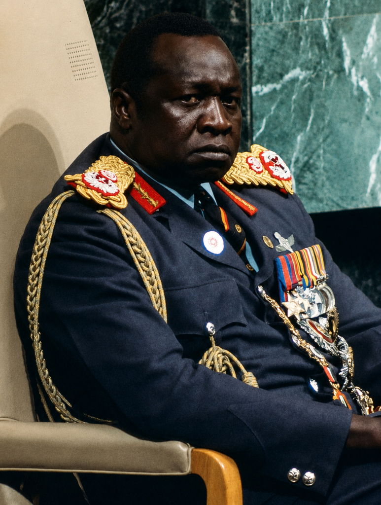 фото 189 Serious Black military officer in a formal dark blue uniform with gold epaulettes and medals.